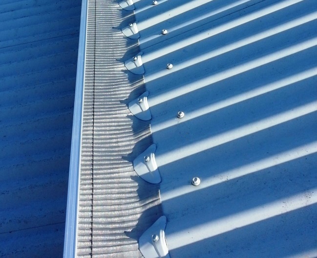 Stainless Steel on a Corrugated Roof by Gumleaf Gutter Guard